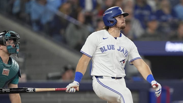 Toronto Blue Jays third baseman Addison Barger (47) hits a two run home run against the Seattle Mariners in the third inning during game six of the ALCS round for the 2025 MLB playoffs at Rogers Centre. 