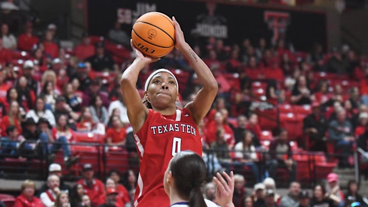 Texas Tech's Snudda Collins shoots against TCU Texas Tech's Snudda Collins shoots against TCU