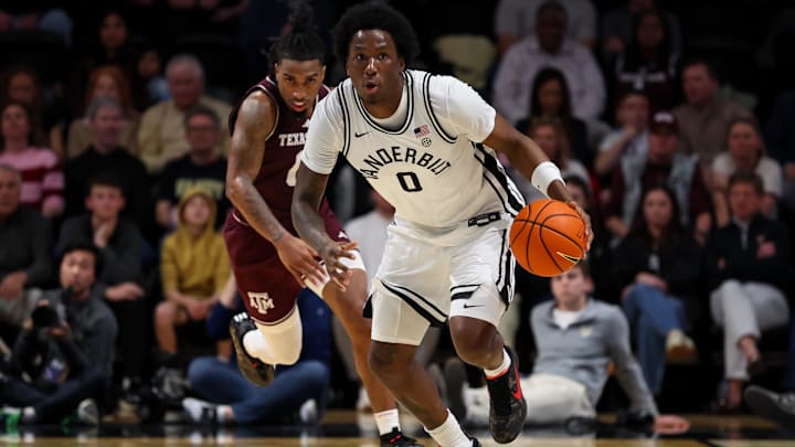 Feb 14, 2026; Nashville, Tennessee, USA;  Vanderbilt Commodores guard Mike James (0) brings the ball up court against the Texas A&M Aggies during the second half at Memorial Gymnasium. Mandatory Credit: Steve Roberts-Imagn Images