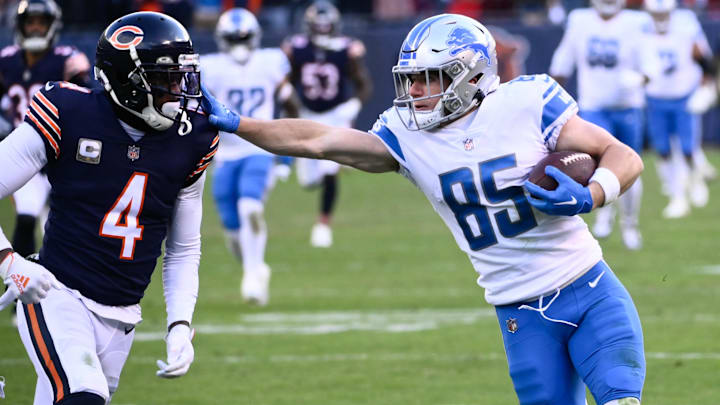 Nov 13, 2022; Chicago, Illinois, USA;  Detroit Lions wide receiver Tom Kennedy (85) runs against Chicago Bears safety Eddie Jackson (4) during the second half at Soldier Field. Mandatory Credit: Matt Marton-Imagn Images