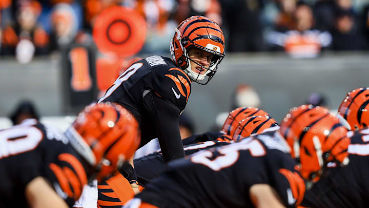 Dec 22, 2024; Cincinnati, Ohio, USA; Cincinnati Bengals quarterback Joe Burrow (9) prepares to snap the ball against the Cleveland Browns in the first half at Paycor Stadium. Mandatory Credit: Katie Stratman-Imagn Images