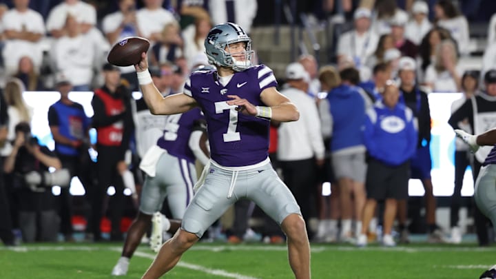 Sep 21, 2024; Provo, Utah, USA; Kansas State Wildcats quarterback Jacob Knuth (7) drops back to pass against the Brigham Young Cougars during the fourth quarter at LaVell Edwards Stadium. Mandatory Credit: Rob Gray-Imagn Images Sep 21, 2024; Provo, Utah, USA; Kansas State Wildcats quarterback Jacob Knuth (7) drops back to pass against the Brigham Young Cougars during the fourth quarter at LaVell Edwards Stadium. Mandatory Credit: Rob Gray-Imagn Images