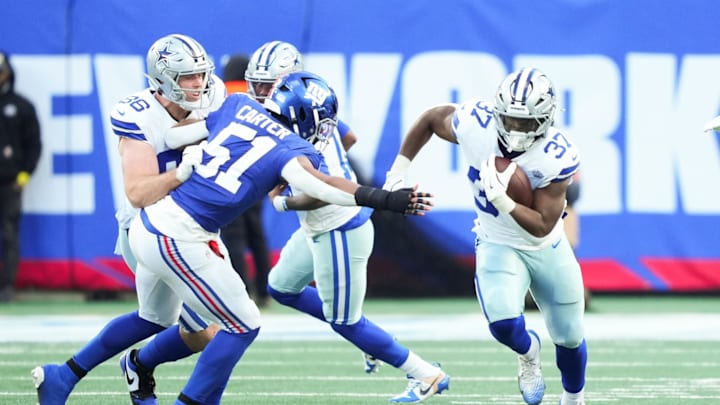 Jan 4, 2026; East Rutherford, New Jersey, USA; Dallas Cowboys running back Phil Mafah (37) rushes during the fourth quarter against the New York Giants at MetLife Stadium. Mandatory Credit: Robert Deutsch-Imagn Images