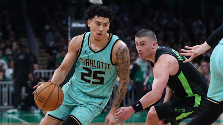 Apr 13, 2025; Boston, Massachusetts, USA; Charlotte Hornets guard KJ Simpson (25) drives to the basket during the second half against the Boston Celtics at TD Garden. Mandatory Credit: Paul Rutherford-Imagn Images