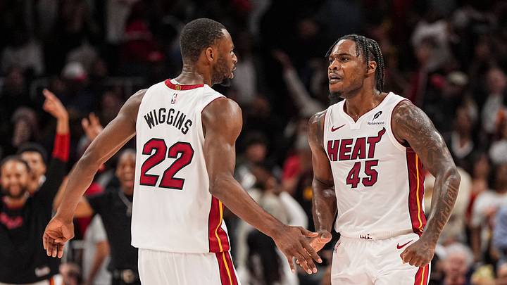 Apr 18, 2025; Atlanta, Georgia, USA; Miami Heat guard Davion Mitchell (45) reacts with forward Andrew Wiggins (22) after the Heat defeated the Atlanta Hawks in overtime at State Farm Arena. Mandatory Credit: Dale Zanine-Imagn Images Apr 18, 2025; Atlanta, Georgia, USA; Miami Heat guard Davion Mitchell (45) reacts with forward Andrew Wiggins (22) after the Heat defeated the Atlanta Hawks in overtime at State Farm Arena. Mandatory Credit: Dale Zanine-Imagn Images