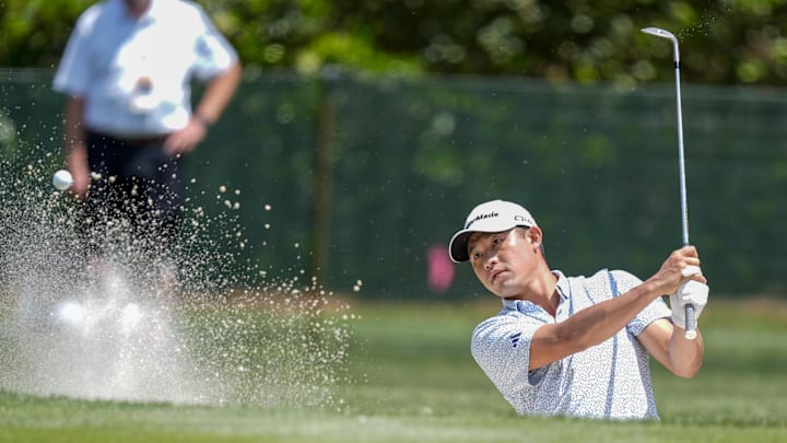Collin Morikawa hits out of the bunker at the RBC Heritage
