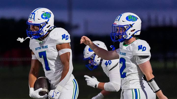 Green Bay Notre Dame's Kingston Allen (7) celebrates after scoring a touchdown against Neenah High School on Friday, Aug. 21, 2026, at Neenah High School in Neenah, Wisconsin. Notre Dame won the game in overtime, 56-53.
Tork Mason/Green Bay Press-Gazette