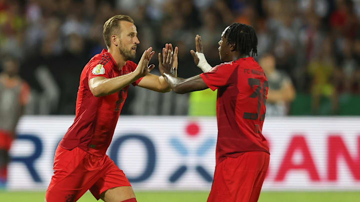 Mathys Tel and Harry Kane 