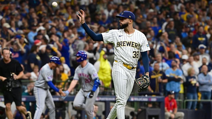Oct 3, 2024; Milwaukee, Wisconsin, USA; Milwaukee Brewers pitcher Devin Williams (38) reacts after a three run home run by New York Mets first baseman Pete Alonso (20) in the ninth inning during game three of the Wildcard round for the 2024 MLB Playoffs at American Family Field.
