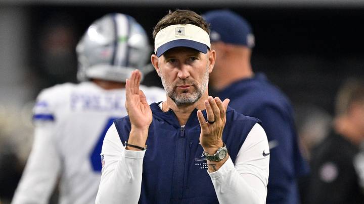 Dallas Cowboys head coach Brian Schottenheimer looks on during warm ups before the game against the New Orleans Saints Dallas Cowboys head coach Brian Schottenheimer looks on during warm ups before the game against the New Orleans Saints