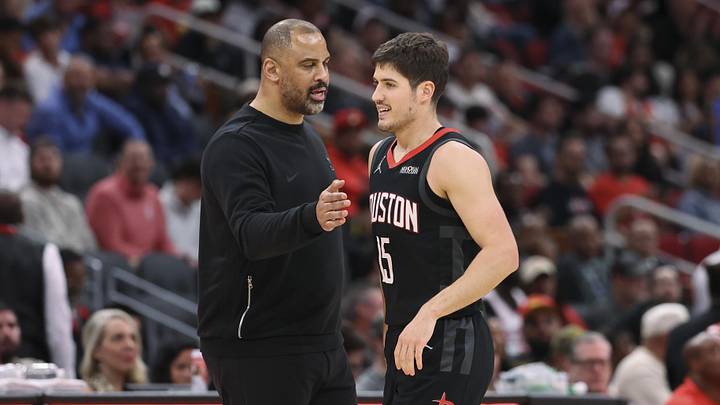 Feb 25, 2026; Houston, Texas, USA; Houston Rockets head coach Ime Udoka reacts with guard Reed Sheppard (15) after the end of the third quarter against the Sacramento Kings at Toyota Center. Mandatory Credit: Troy Taormina-Imagn Images