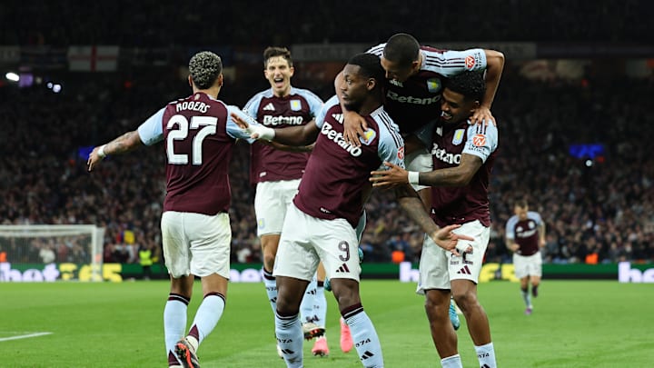 Aston Villa players celebrate their late winner against Bayern Munich 