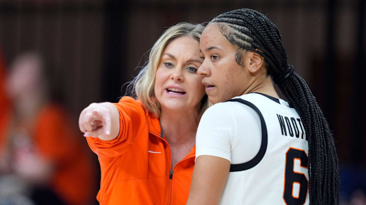 Oklahoma State coach Jacie Hoyt talks with guard Jadyn Wooten (6) during a women's college basketball game between the Oklahoma State Cowgirls (OSU) and the Arizona State Sun Devils at Gallagher-Iba Arena in Stillwater, Okla., Wednesday, Jan. 29, 2025.