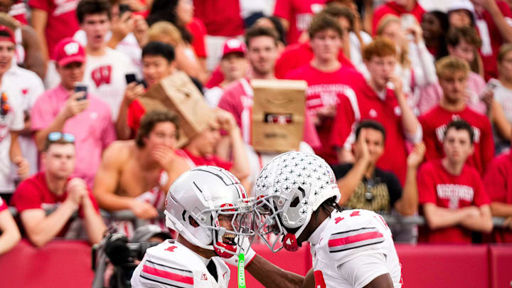 Ohio State Buckeyes wide receiver Brandon Inniss (1) celebrates after scoring a touchdown with Carnell Tate (17) in the second half at Camp Randall Stadium on Saturday, Oct. 18, 2025 in Madison, Wisconsin.