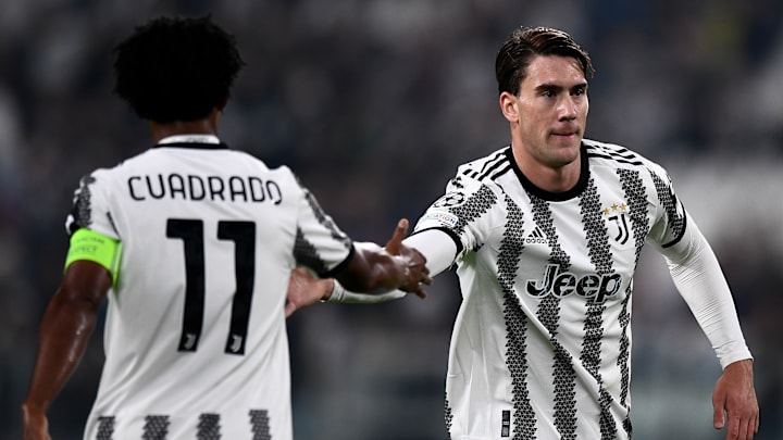 Juan Cuadrado y Dusan Vlahovic