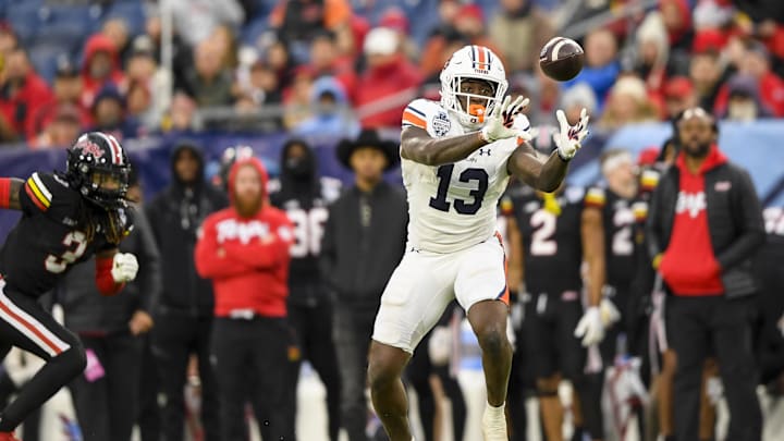 Dec 30, 2023; Nashville, TN, USA; Auburn Tigers tight end Rivaldo Fairweather (13) makes a catch