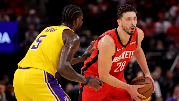 May 1, 2026; Houston, Texas, USA; Houston Rockets center Alperen Sengun (28) handles the ball against Los Angeles Lakers center Deandre Ayton (5) during the first quarter game six of the first round of the 2026 NBA Playoffs at Toyota Center. Mandatory Credit: Erik Williams-Imagn Images May 1, 2026; Houston, Texas, USA; Houston Rockets center Alperen Sengun (28) handles the ball against Los Angeles Lakers center Deandre Ayton (5) during the first quarter game six of the first round of the 2026 NBA Playoffs at Toyota Center. Mandatory Credit: Erik Williams-Imagn Images