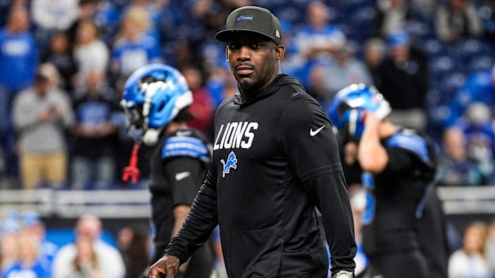 Detroit Lions assistant head coach and wide receivers coach Scottie Montgomery watches warmups ahead of the New York Giants game at Ford Field in Detroit on Sunday, Nov. 23, 2025. Detroit Lions assistant head coach and wide receivers coach Scottie Montgomery watches warmups ahead of the New York Giants game at Ford Field in Detroit on Sunday, Nov. 23, 2025.