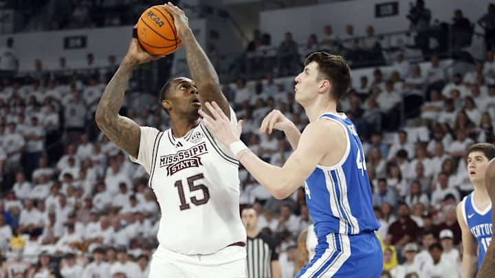 Feb 27, 2024; Starkville, Mississippi, USA; Mississippi State Bulldogs forward Jimmy Bell Jr. (15) shoots as Kentucky Wildcats forward Zvonimir Ivisic (44) defends during the first half at Humphrey Coliseum. Mandatory Credit: Petre Thomas-Imagn Images