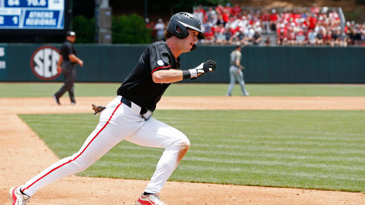 Georgia's Charlie Condon (24) runs home to score a run during a NCAA Athens Regional baseball game against Army in Athens, Ga., on Friday, May 31, 2024. Georgia won 8-7.