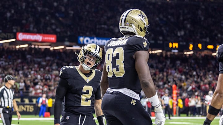 Sep 14, 2025; New Orleans, Louisiana, USA; New Orleans Saints quarterback Spencer Rattler (2) and tight end Juwan Johnson (83) celebrate a touchdown against the San Francisco 49ers during the first half at Caesars Superdome. Mandatory Credit: Stephen Lew-Imagn Images Sep 14, 2025; New Orleans, Louisiana, USA; New Orleans Saints quarterback Spencer Rattler (2) and tight end Juwan Johnson (83) celebrate a touchdown against the San Francisco 49ers during the first half at Caesars Superdome. Mandatory Credit: Stephen Lew-Imagn Images