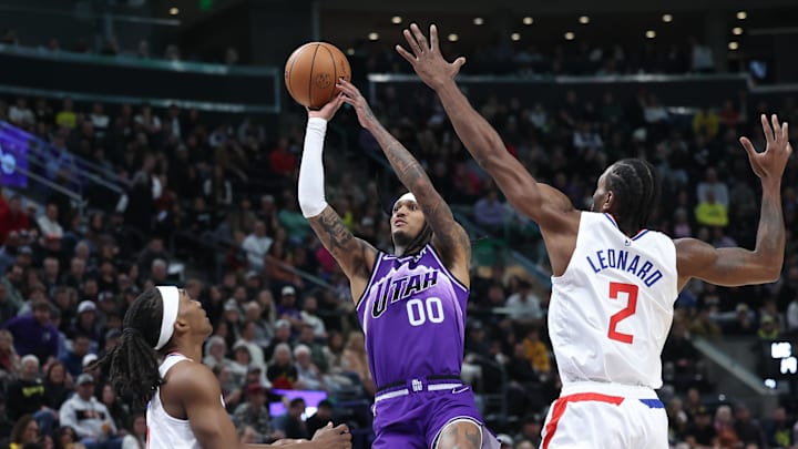 Dec 8, 2023; Salt Lake City, Utah, USA; Utah Jazz guard Jordan Clarkson (00) shoots against Los