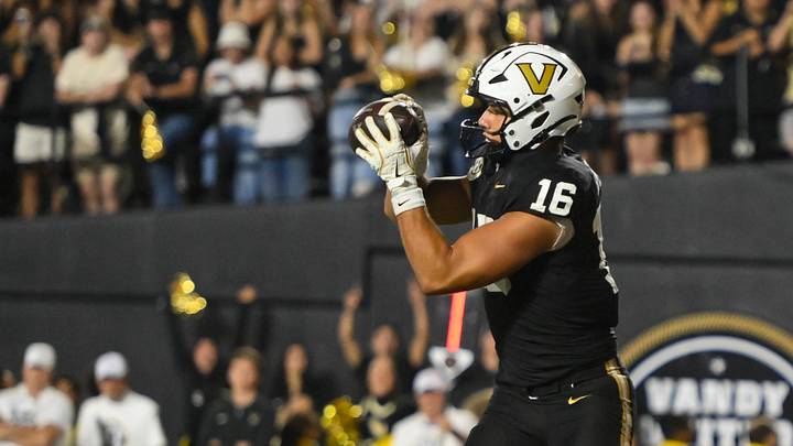 Nov 8, 2025; Nashville, Tennessee, USA; Vanderbilt Commodores tight end Cole Spence (16) scores what becomes the game winning touchdown against the Auburn Tigers during the overtime period at FirstBank Stadium. Mandatory Credit: Steve Roberts-Imagn Images Nov 8, 2025; Nashville, Tennessee, USA; Vanderbilt Commodores tight end Cole Spence (16) scores what becomes the game winning touchdown against the Auburn Tigers during the overtime period at FirstBank Stadium. Mandatory Credit: Steve Roberts-Imagn Images