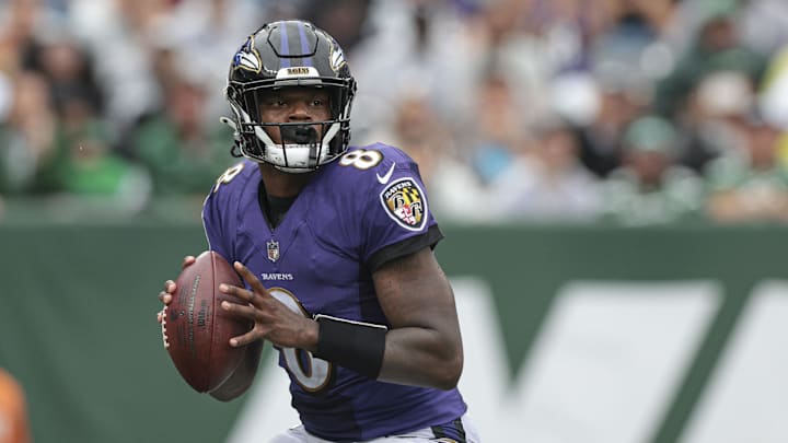 Sep 11, 2022; East Rutherford, New Jersey, USA; Baltimore Ravens quarterback Lamar Jackson (8) drops back to pass during the second half against the New York Jets at MetLife Stadium. Mandatory Credit: Vincent Carchietta-Imagn Images Sep 11, 2022; East Rutherford, New Jersey, USA; Baltimore Ravens quarterback Lamar Jackson (8) drops back to pass during the second half against the New York Jets at MetLife Stadium. Mandatory Credit: Vincent Carchietta-Imagn Images