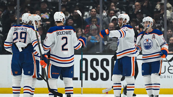 Feb 26, 2026; Los Angeles, California, USA; Edmonton Oilers center Connor McDavid (97) goes to fist bump Edmonton Oilers defenseman Evan Bouchard (2) after a goal against the Los Angeles Kings during the second period at Crypto.com Arena. Mandatory Credit: Griffin Hooper-Imagn Images