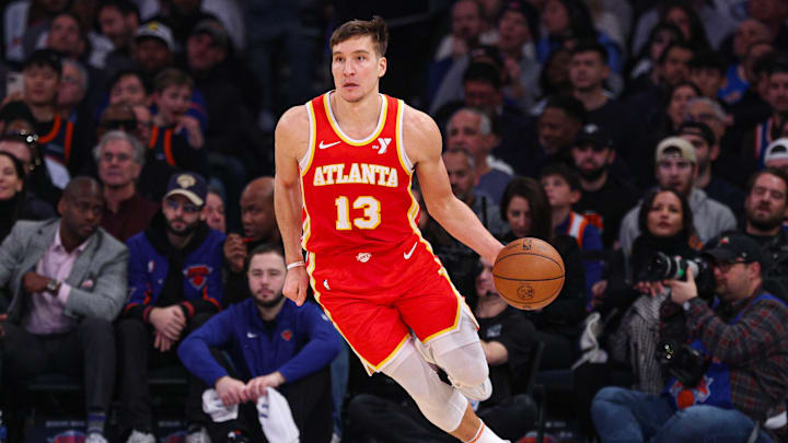Jan 20, 2025; New York, New York, USA; Atlanta Hawks guard Bogdan Bogdanovic (13) dribbles up court during the first half against the New York Knicks at Madison Square Garden. Mandatory Credit: Vincent Carchietta-Imagn Images