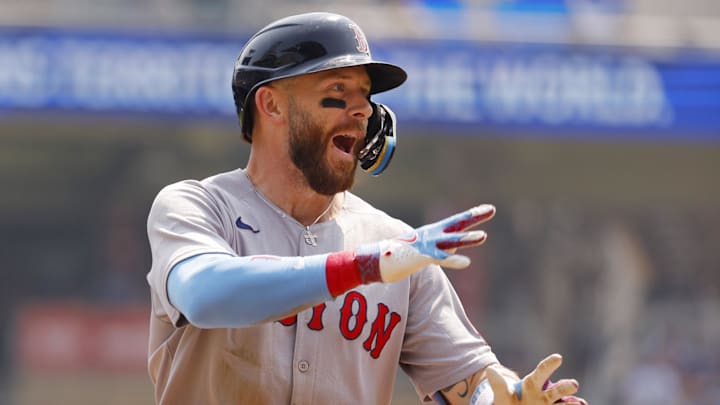 Jul 30, 2025; Minneapolis, Minnesota, USA; Boston Red Sox shortstop Trevor Story (10) celebrates and runs the bases on his solo home run against the Minnesota Twins in the second inning at Target Field. Mandatory Credit: Bruce Kluckhohn-Imagn Images