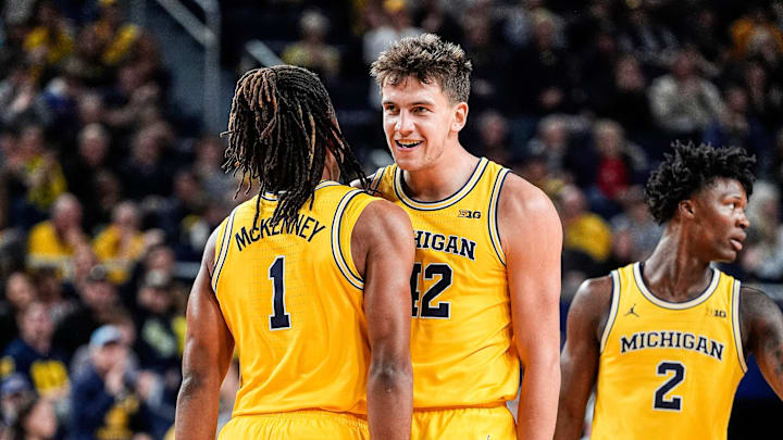 Michigan forward Will Tschetter (42) celebrates a 3-pointer against the Villanova with guard Trey McKenney (1) during the first half at Crisler Center in Ann Arbor on Tuesday, Dec. 9, 2025.