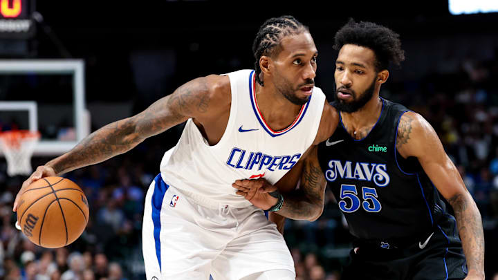 Dec 20, 2023; Dallas, Texas, USA; LA Clippers forward Kawhi Leonard (2) controls the ball as Dallas Mavericks forward Derrick Jones Jr. (55) defends during the second half at American Airlines Center. Mandatory Credit: Kevin Jairaj-Imagn Images Dec 20, 2023; Dallas, Texas, USA; LA Clippers forward Kawhi Leonard (2) controls the ball as Dallas Mavericks forward Derrick Jones Jr. (55) defends during the second half at American Airlines Center. Mandatory Credit: Kevin Jairaj-Imagn Images