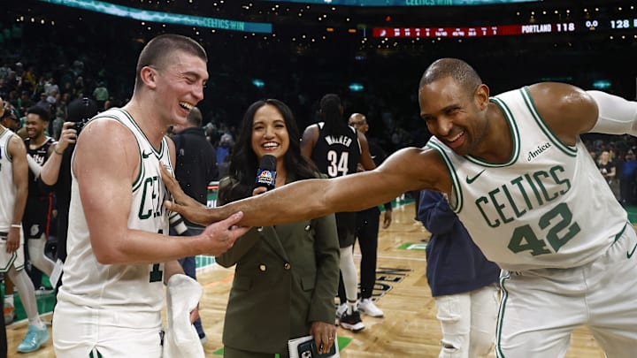 Mar 5, 2025; Boston, Massachusetts, USA; After scoring a career high 43 points, Boston Celtics guard Payton Pritchard (11) has a laugh with center Al Horford (42) after their win over the Portland Trail Blazers at TD Garden. Mandatory Credit: Winslow Townson-Imagn Images