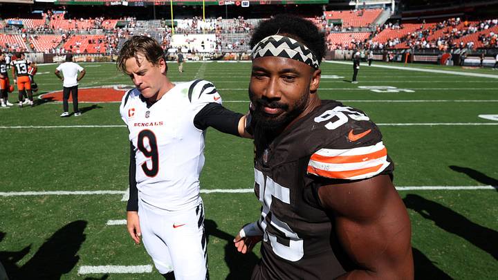 Sep 7, 2025; Cleveland, Ohio, USA; Cincinnati Bengals quarterback Joe Burrow (9) and Cleveland Browns defensive end Myles Garrett (95) greet each other after a game at Huntington Bank Field. Mandatory Credit: Scott Galvin-Imagn Images