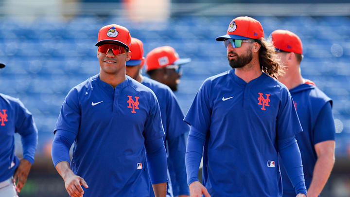 Feb 19, 2025; Port St. Lucie, FL, USA; New York Mets right fielder Juan Soto (22) and left fielder Jesse Winker (3) looks on during a spring training workout at Clover Park. Mandatory Credit: Sam Navarro-Imagn Images