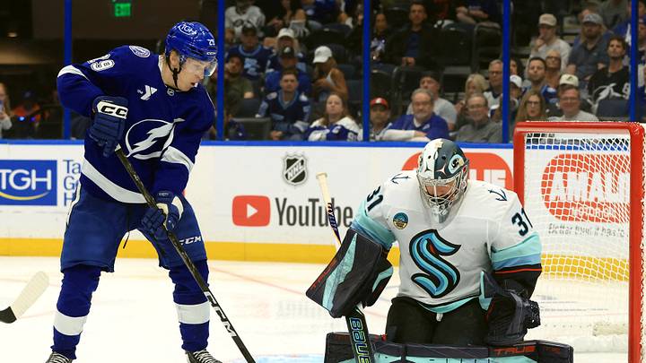 Oct 15, 2026; Tampa, Florida, USA;  Seattle Kraken goaltender Philipp Grubauer (31) makes a save against Tampa Bay Lightning right wing Pontus Holmberg (29) during the third period at Benchmark International Arena.  Mandatory Credit: Kim Klement Neitzel-Imagn Images