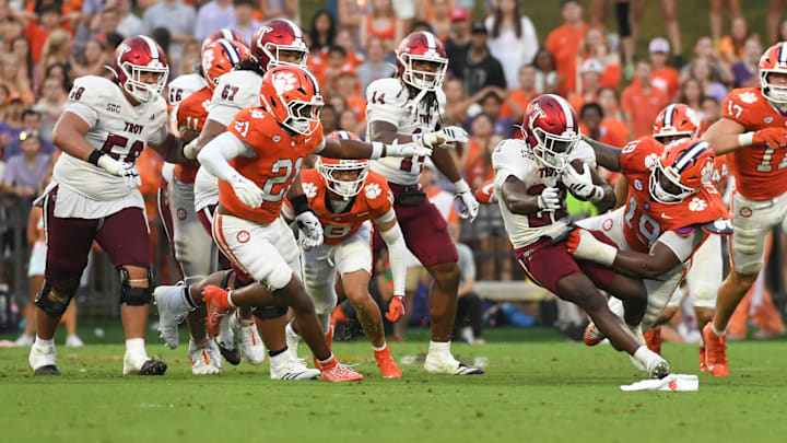 Troy Trojans running back Tae Meadows (22) rushes the ball Saturday, Sept. 6, 2025 during the NCAA football game against the Clemson Tigers at Memorial Stadium in Clemson, South Carolina. Troy Trojans running back Tae Meadows (22) rushes the ball Saturday, Sept. 6, 2025 during the NCAA football game against the Clemson Tigers at Memorial Stadium in Clemson, South Carolina.