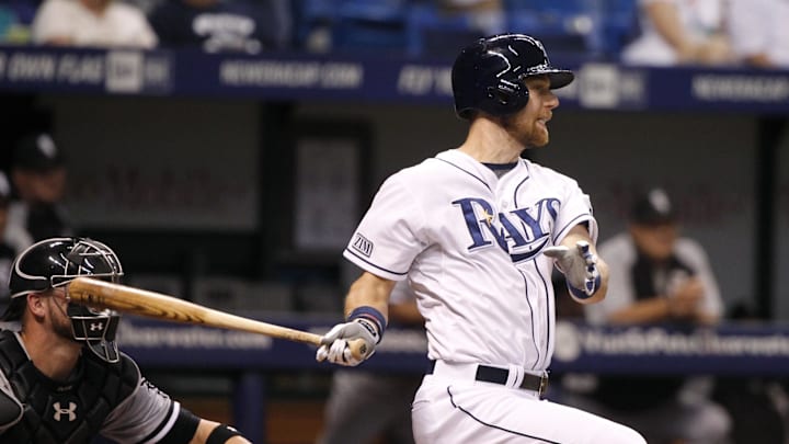 Tampa Bay Rays second baseman Ben Zobrist (18) hits a RBI single during the fifth inning against the Chicago White Sox at Tropicana Field in 2014.