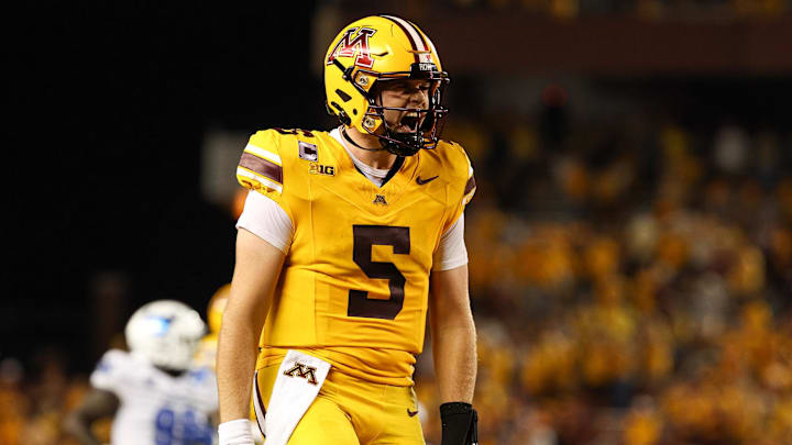 Aug 28, 2025; Minneapolis, Minnesota, USA; Minnesota Golden Gophers quarterback Drake Lindsey (5) celebrates wide receiver Jalen Smith's (8) touchdown against the Buffalo Bulls during the second half of the game at Huntington Bank Stadium. Mandatory Credit: Matt Krohn-Imagn Images Aug 28, 2025; Minneapolis, Minnesota, USA; Minnesota Golden Gophers quarterback Drake Lindsey (5) celebrates wide receiver Jalen Smith's (8) touchdown against the Buffalo Bulls during the second half of the game at Huntington Bank Stadium. Mandatory Credit: Matt Krohn-Imagn Images