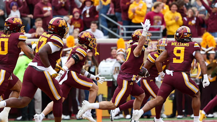 Sep 6, 2025; Minneapolis, Minnesota, USA; Minnesota Golden Gophers defensive back John Nestor (17) celebrates as he returns an interception for a touchdown against the Northwestern State Demons during the first quarter at Huntington Bank Stadium. Mandatory Credit: Matt Krohn-Imagn Images