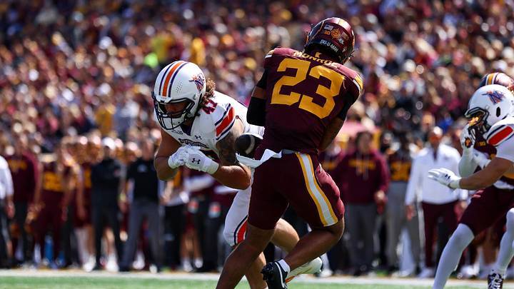 Sep 6, 2025; Minneapolis, Minnesota, USA; Minnesota Golden Gophers defensive back Garrison Monroe (23) forces a fumble against Northwestern State Demons tight end Ryan Tyler (47) during the second quarter at Huntington Bank Stadium. Mandatory Credit: Matt Krohn-Imagn Images Sep 6, 2025; Minneapolis, Minnesota, USA; Minnesota Golden Gophers defensive back Garrison Monroe (23) forces a fumble against Northwestern State Demons tight end Ryan Tyler (47) during the second quarter at Huntington Bank Stadium. Mandatory Credit: Matt Krohn-Imagn Images