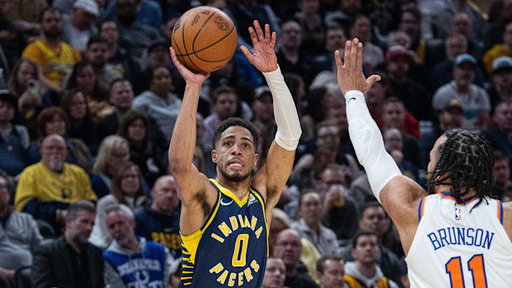 Feb 11, 2025; Indianapolis, Indiana, USA; Indiana Pacers guard Tyrese Haliburton (0) shoots the ball while New York Knicks guard Jalen Brunson (11) defends in the first half at Gainbridge Fieldhouse. Mandatory Credit: Trevor Ruszkowski-Imagn Images Feb 11, 2025; Indianapolis, Indiana, USA; Indiana Pacers guard Tyrese Haliburton (0) shoots the ball while New York Knicks guard Jalen Brunson (11) defends in the first half at Gainbridge Fieldhouse. Mandatory Credit: Trevor Ruszkowski-Imagn Images