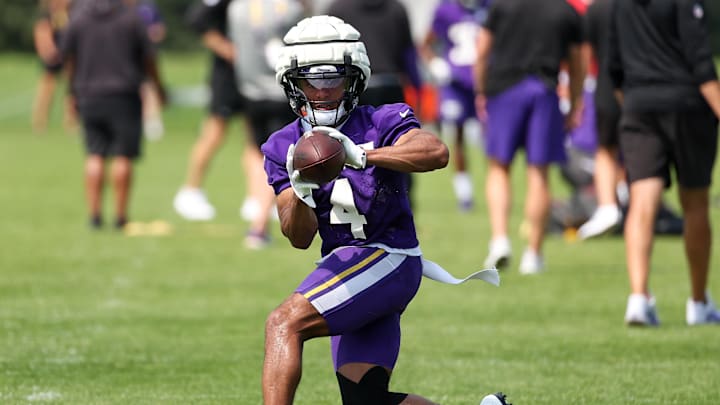 Minnesota Vikings wide receiver Rondale Moore (4) takes part in drills