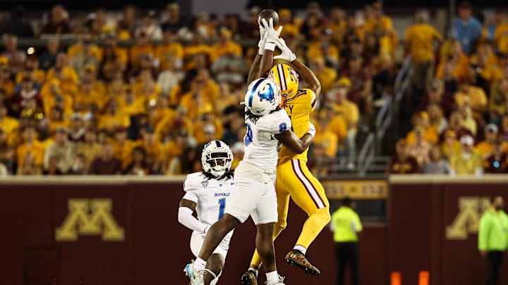 Aug 28, 2025; Minneapolis, Minnesota, USA; Buffalo Bulls cornerback Jalen McNair (8) breaks up a pass intended for Minnesota Golden Gophers wide receiver Javon Tracy (11) during the first half of the game at Huntington Bank Stadium. Mandatory Credit: Matt Krohn-Imagn Images