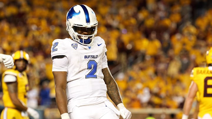 Aug 28, 2025; Minneapolis, Minnesota, USA; Buffalo Bulls quarterback Ta'Quan Roberson (2) celebrates wide receiver Victor Snow's (0) touchdown catch against the Minnesota Golden Gophers during the second half of the game at Huntington Bank Stadium. Mandatory Credit: Matt Krohn-Imagn Images Aug 28, 2025; Minneapolis, Minnesota, USA; Buffalo Bulls quarterback Ta'Quan Roberson (2) celebrates wide receiver Victor Snow's (0) touchdown catch against the Minnesota Golden Gophers during the second half of the game at Huntington Bank Stadium. Mandatory Credit: Matt Krohn-Imagn Images