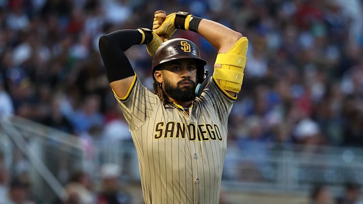 Aug 29, 2025; Minneapolis, Minnesota, USA; San Diego Padres right fielder Fernando Tatis Jr. (23) reacts after hitting a fly out against the Minnesota Twins during the third inning at Target Field. Mandatory Credit: Matt Krohn-Imagn Images Aug 29, 2025; Minneapolis, Minnesota, USA; San Diego Padres right fielder Fernando Tatis Jr. (23) reacts after hitting a fly out against the Minnesota Twins during the third inning at Target Field. Mandatory Credit: Matt Krohn-Imagn Images