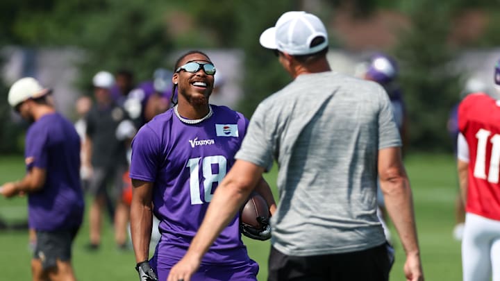 Jul 28, 2025; Eagan, MN, USA; Minnesota Vikings wide receiver Justin Jefferson (18) smiles towards head coach Kevin O'Connell during the teams training camp at the Minnesota Vikings Training Facility. Mandatory Credit: Matt Krohn-Imagn Images
