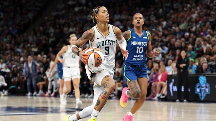 Aug 16, 2025; Minneapolis, Minnesota, USA; New York Liberty guard Natasha Cloud (9) drives towards the basket as Minnesota Lynx guard Courtney Williams (10) defends during the first quarter at Target Center. Mandatory Credit: Matt Krohn-Imagn Images