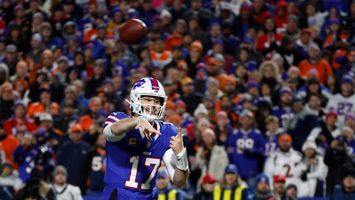 Buffalo Bills quarterback Josh Allen (17) looks downfield against the Broncos.